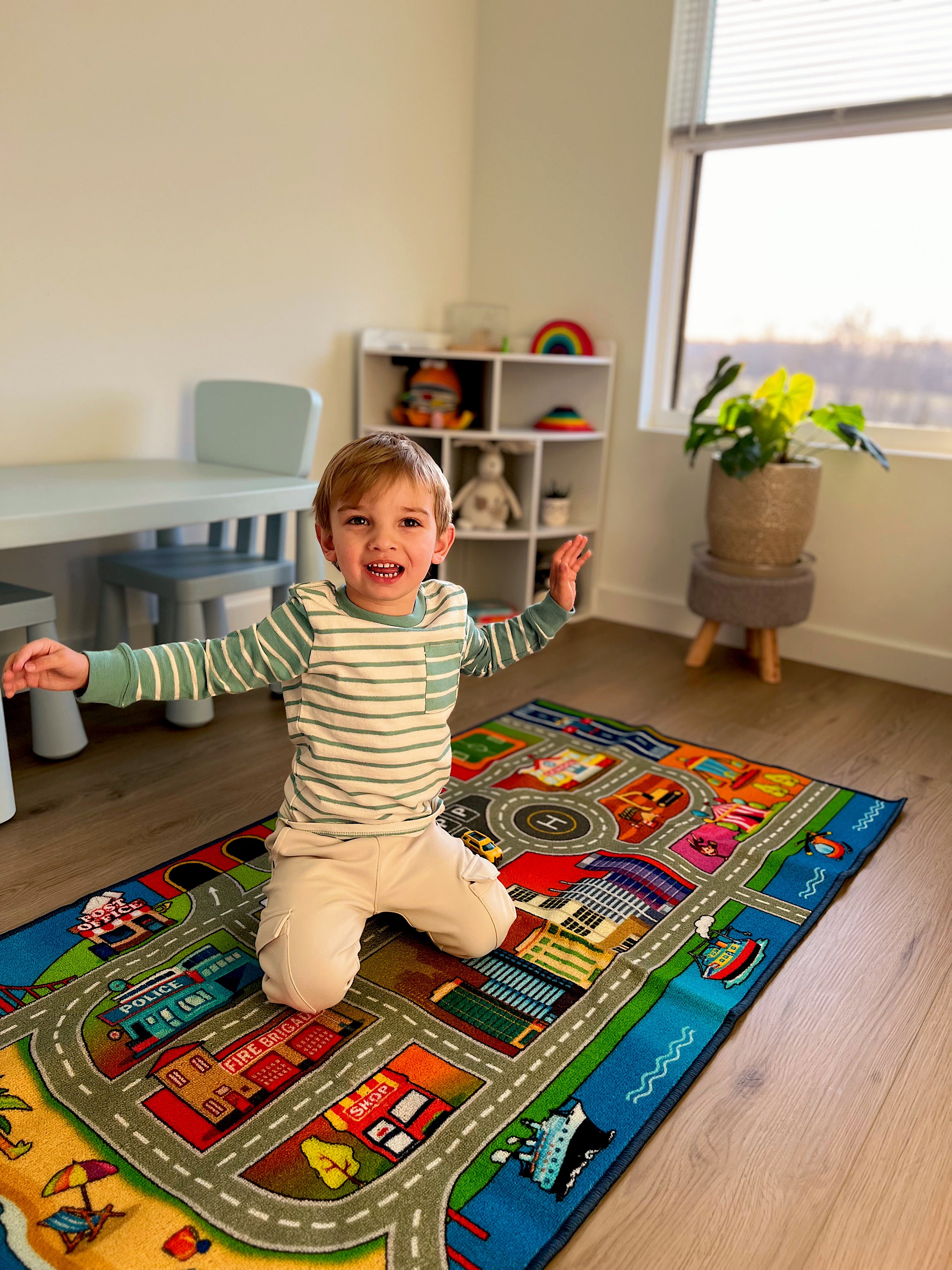 Kids playing on colorful kids rugs at home
